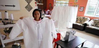 For Malaysian schoolgirl, homework is sewing PPE gowns