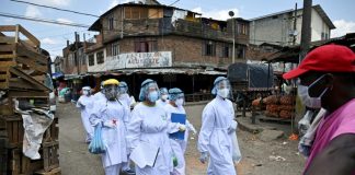 WHO to review virus response as Trump renews attack