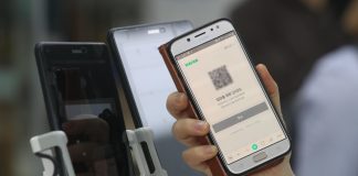QR registration test draws mixed reaction from businesses, visitors