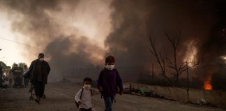 Greece races to shelter migrants after Lesbos camp fire