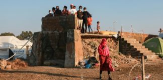 Greece warms to EU asylum pact but refugee groups rage