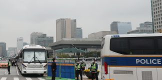 Police on standby to deter illegal rallies on national holiday amid virus outbreak