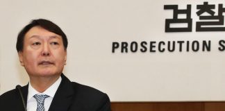 Yoon returns to work as court upholds his suit