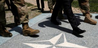 Taliban warn NATO to push ahead with troop withdrawal in Afghanistan